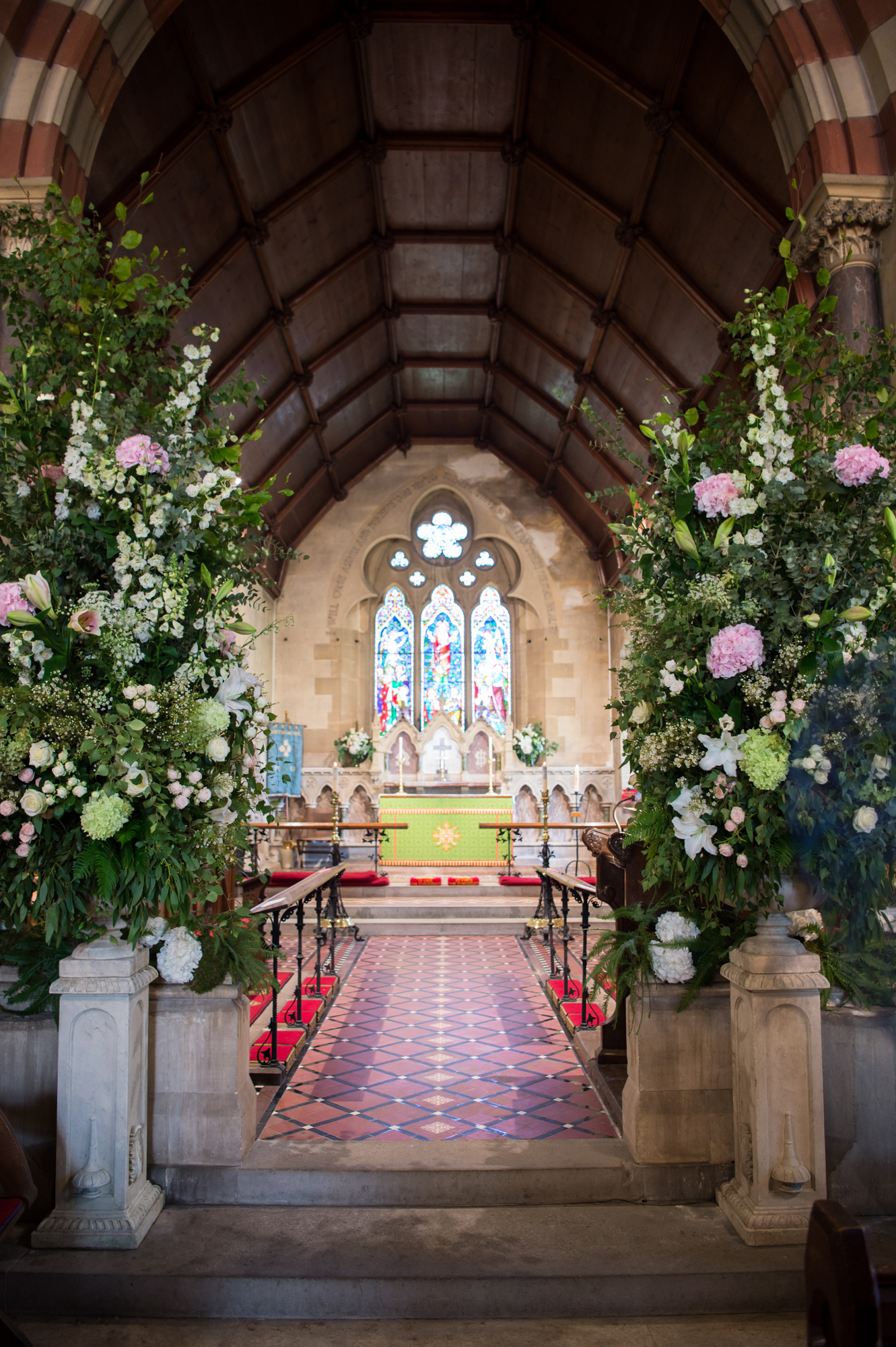 Floral pew decoration by Copelands Flowers
